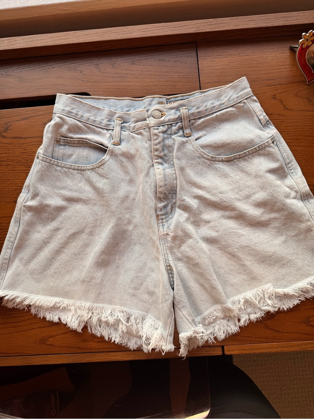 Vintage Light Wash Fringe Hem Denim Shorts